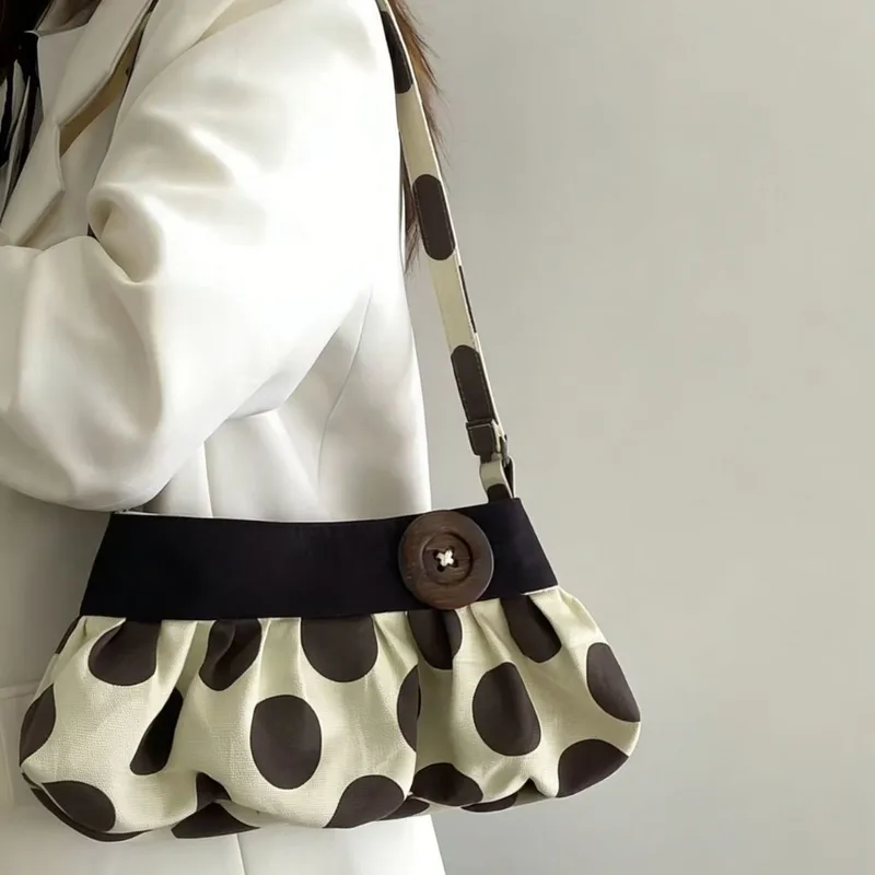 Polka dot cloud shoulder bag
