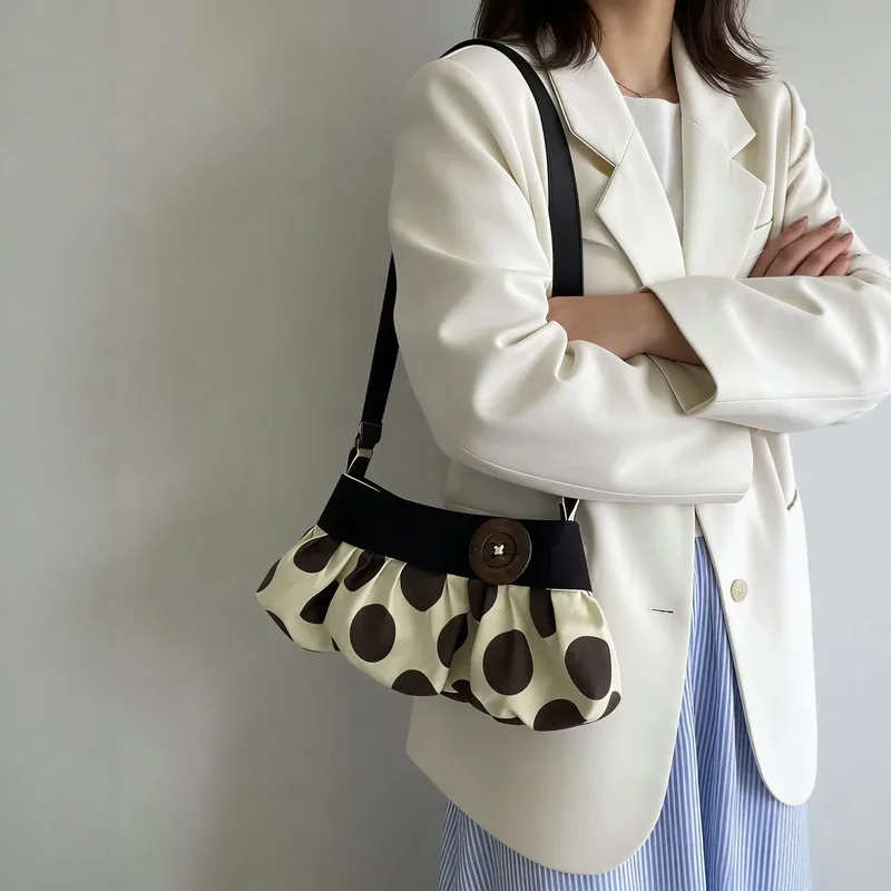 Polka dot cloud shoulder bag
