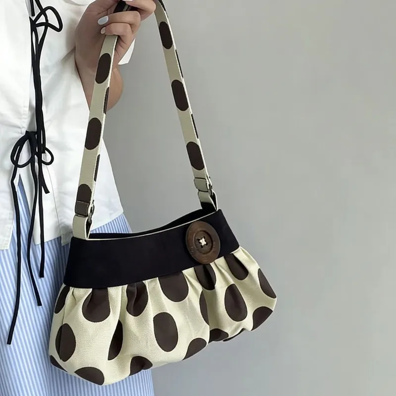 Polka dot cloud shoulder bag